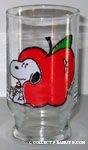 Snoopy sitting by apple