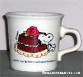 Snoopy and a piece of chocolate cake