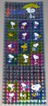 Snoopy sitting under an umbrella Stickers