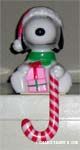 Snoopy holding Candy Cane Stocking Hanger