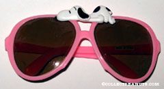 Snoopy sleeping on Pink Sunglasses