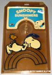 Snoopy & Woodstock laying on rainbow Sun Catcher